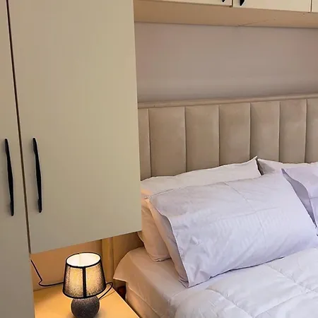 Apartmenti C1 Dhoma 34